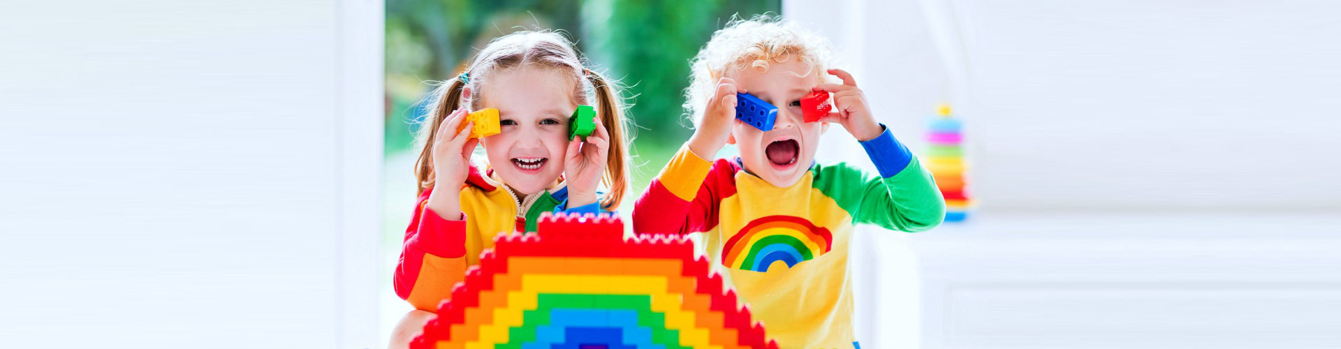 two children playing lego